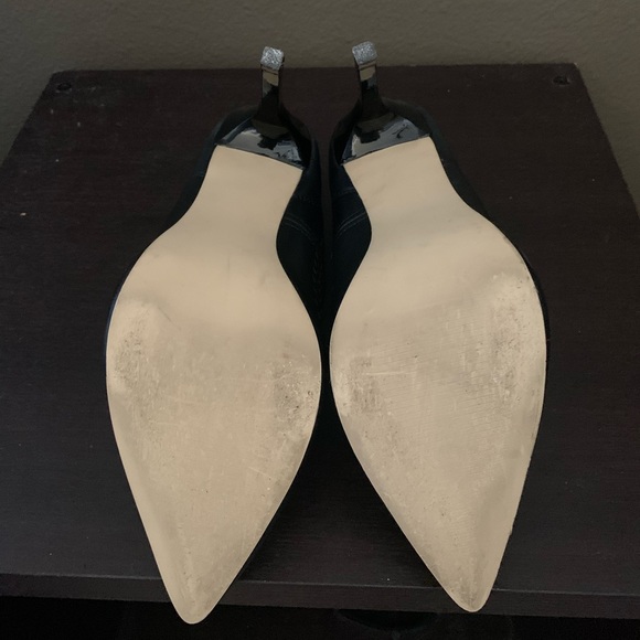 Black stilettos with a fun design around the rim. Have only been worn twice. - Picture 5 of 5